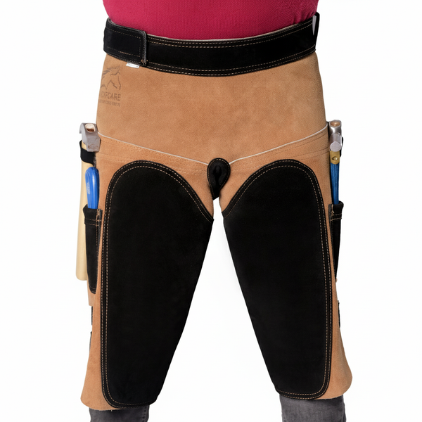 Equine Care beige and black leather farrier apron USA, two-tone suede design with EVA padding, hoof knife and farrier hammer pockets for hoof trimming.