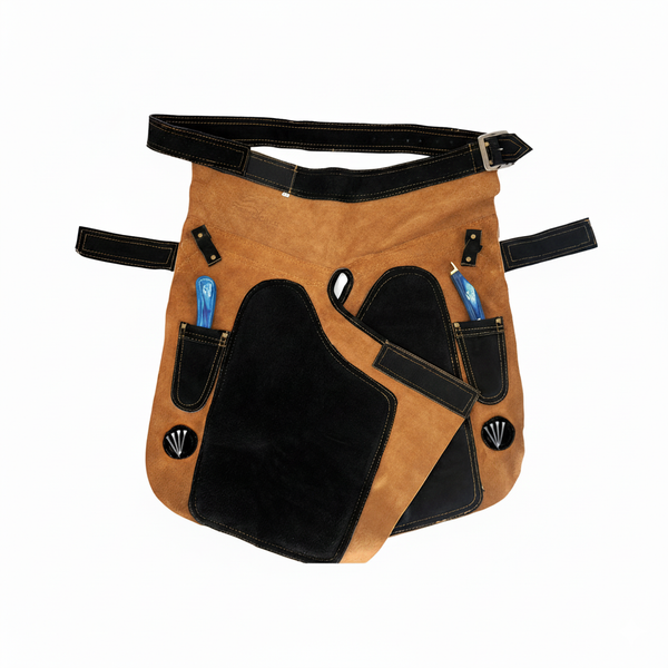 Equine Care beige and black suede farrier apron laid flat, showing belt, hammer loop, hoof knife pockets, and magnetic nail holders for trimming.