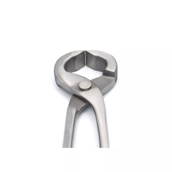 Close-up of serrated jaws on Equine Care horseshoe puller designed to grip clinched horseshoes securely