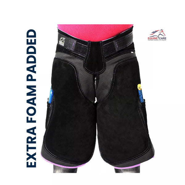 A durable women’s farrier apron made from suede leather with foam padding and tool pockets for hoof trimming